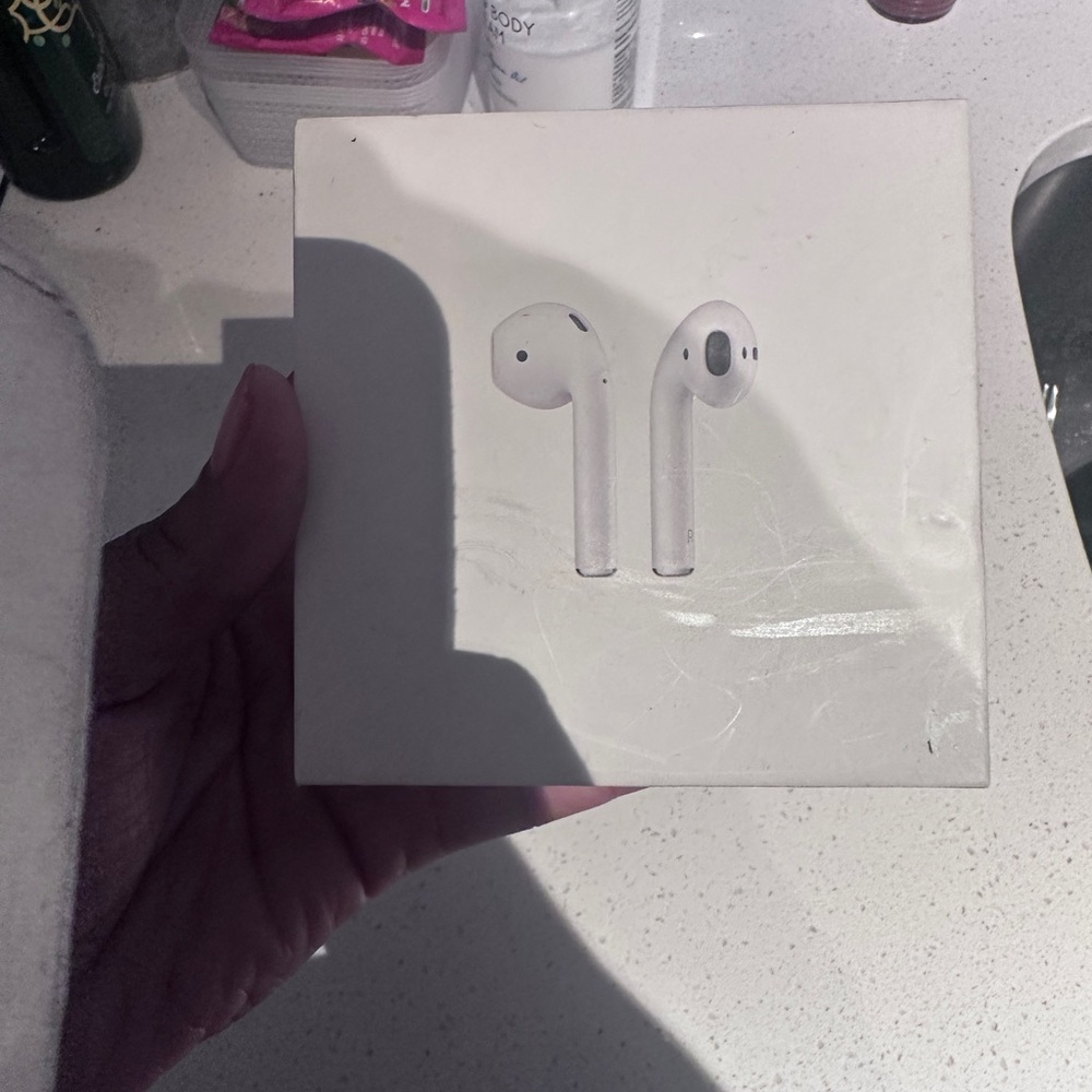 BRAND NEW/ Never USED- AirPods with Charging Case